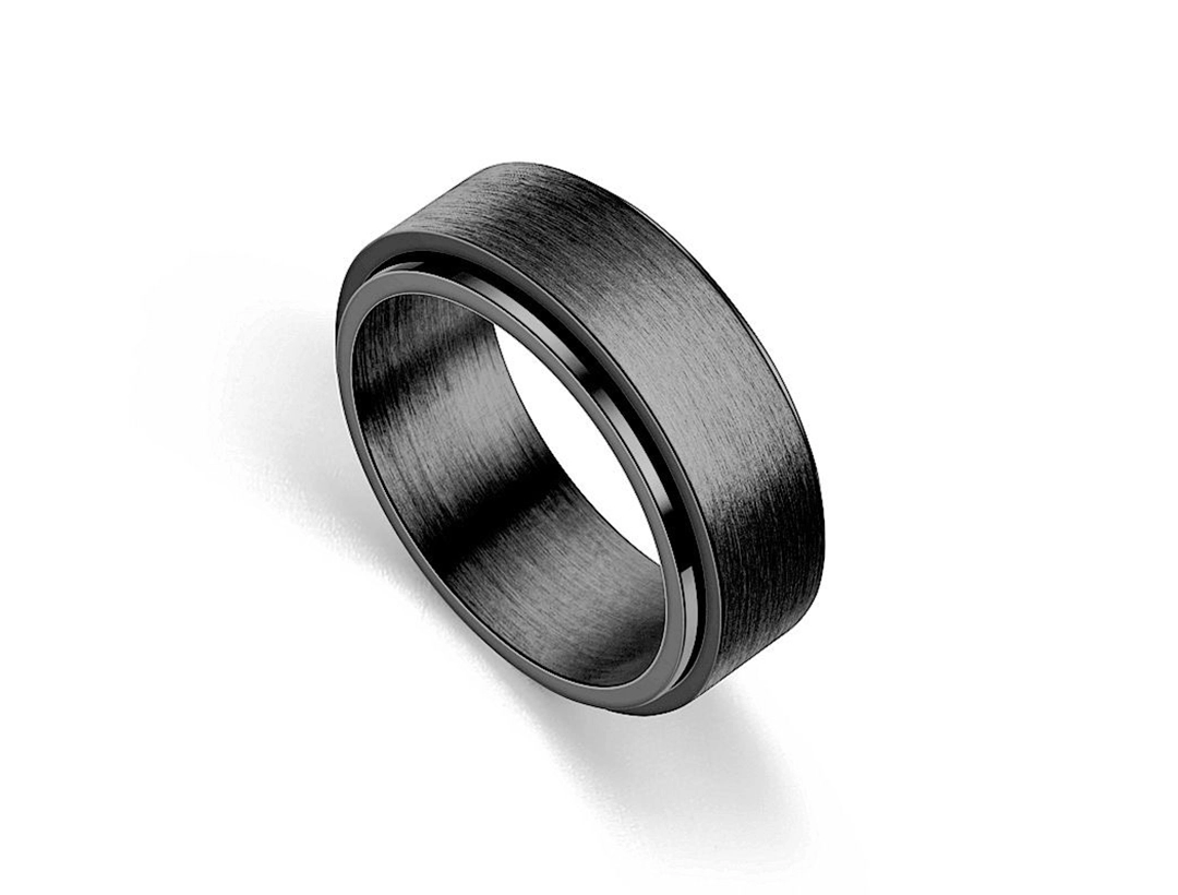 A sleek black ADHD ring with a brushed metal finish, designed to provide sensory stimulation and stress relief.