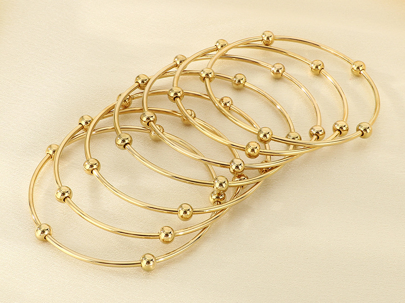 Polished Gold Bangles with Beaded Accents